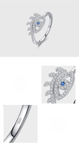 Macro view of S925 sterling silver evil eye ring with hand-set blue and white zircons