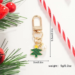 Detail view of Christmas tree keychain with dimensions and pearl bead accent