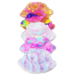 Close-up of fluffy faux fur bucket hats featuring vibrant rainbow tie-dye gradient colors
