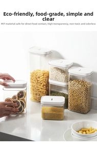 Detail showing various sizes of clear PET food storage containers with white lids