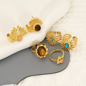 Gold-plated stainless steel open rings with turquoise and opal in sun and eye designs