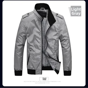 Detail view of light gray bomber jacket featuring black ribbed collar and checkered lining