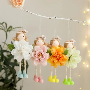 Easter flower angel hanging ornaments in four pastel colors on decorative branches
