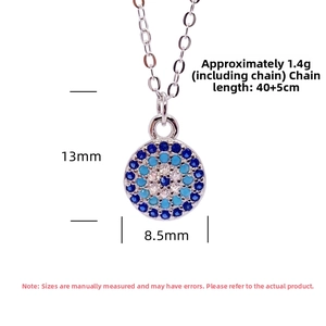 Detail of S925 sterling silver evil eye pendant showing 13mm size and zircon inlay