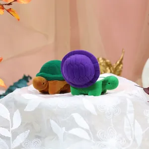 Cute cartoon turtle velvet jewelry box set for rings and earrings on lace background
