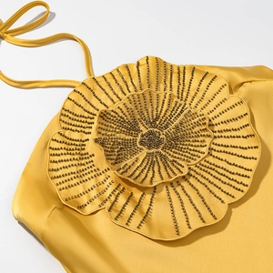 Yellow satin halter evening dress featuring handmade 3D floral beadwork and embroidery