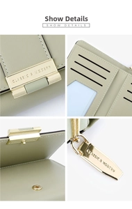 Detail view of women's leather wallet with card slots, ID window and gold hardware
