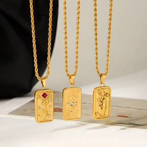 Gold stainless steel tarot card necklace with lovers stars relief and cubic zirconia
