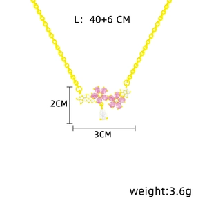 Detail of gold necklace with pink flower pendant and waterdrop gemstone, 40+6cm chain