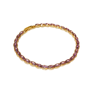 Exquisite gold-plated tennis bracelet featuring oval purple zircons with folding clasp