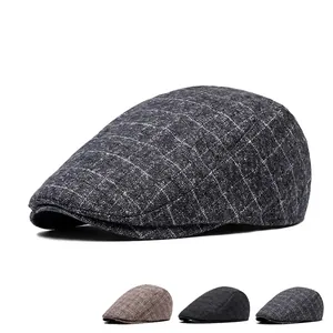 Winter padded beret hat with vintage plaid pattern and warm quilted lining for men
