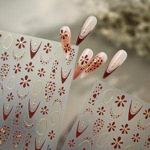 Minimalist leopard print and gold line nail stickers in vintage reddish brown and cream