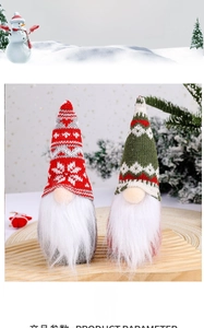 Close-up of festive gnomes with snowflake knit hats and long white beards in a cozy setting