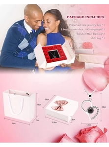 Detail of heart necklace set with preserved flower box and gift bag packaging