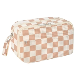 Detailed side view of the beige checkered corduroy makeup bag with three silver zippers