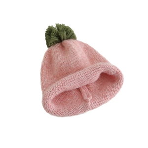 Pink knitted beanie with green pompom and rolled edge for children winter fashion