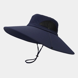 Detail of outdoor wide-brim sun hat showing side mesh vents and adjustable wind rope