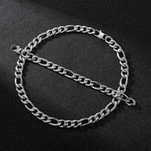 Silver stainless steel Figaro chain necklace for men with rock hip-hop style on black background