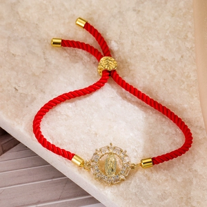 Red braided cord bracelet with 18K gold plated Mary pendant and sparkling zircon stones