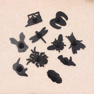 Set of 10 black enamel animal pins including dragonfly and beetle with rubber backings