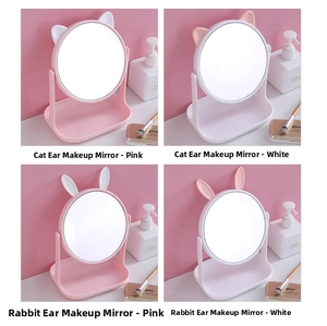 Detail of cartoon cat and rabbit ear vanity mirrors with storage tray in pink and white