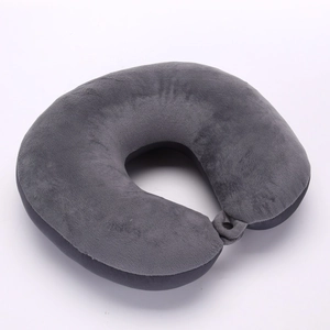 U-shaped travel neck pillow in dark grey plush fabric with adjustable buckle