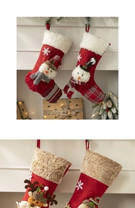 Close-up of festive Christmas socks with plush snowman and reindeer 3D character details