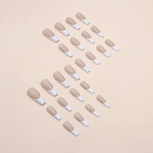 Long ballet aurora white French press-on nails with sparkling shards and nude pink base