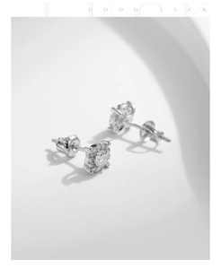Macro shot of S925 sterling silver halo stud earrings with secure screw back design