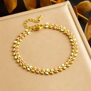 Golden stainless steel chain bracelet with pink and white enamel wheat leaves