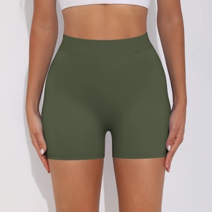 Detail of high-waisted olive green yoga shorts showing seamless compression fabric texture