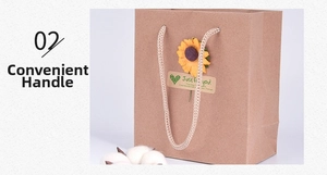 Detail of kraft paper gift bag with sunflower decoration and convenient woven handles