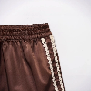 Brown satin casual shorts with white lace trim and elastic waistband for women