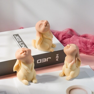 Three creative Easter bunny figurines with human faces for home decor and candles