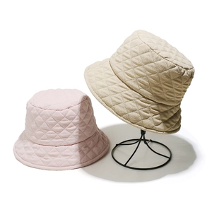 Women's quilted checkerboard bucket hats in pink and beige for autumn and winter warmth