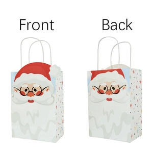 Front and back view of a Christmas kraft paper gift bag with Santa Claus cartoon print