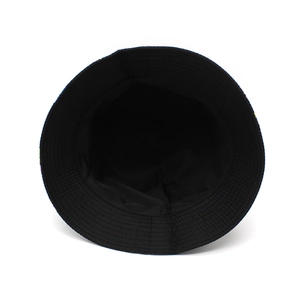 Detail of black cotton bucket hat interior showing reinforced stitched brim and lining