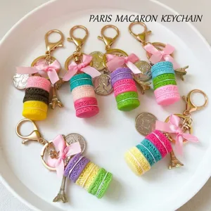Colorful macaron keychain set with pink bow and Eiffel Tower charm