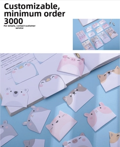 Close-up of cute cartoon animal sticky notes featuring pig, penguin, and polar bear designs