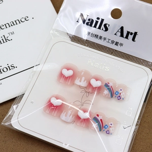 Pink gradient press-on nails with 3D white hearts and rainbow patterns in size S