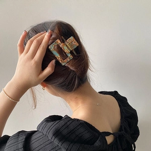 Elegant marble pattern square hair claw clip for women featuring blue and gold acetate finish