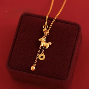 Detailed close-up of a 3D gold horse pendant necklace with lucky coin and metal bead