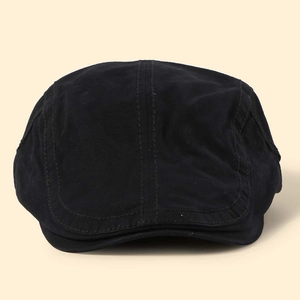 Detailed view of black adjustable cotton ivy cap with reinforced stitching and vintage style
