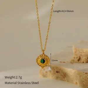 Vintage gold stainless steel necklace featuring a round green malachite stone pendant
