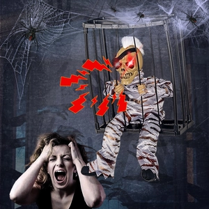Animated Halloween prisoner in cage with glowing red eyes and spooky sound effects