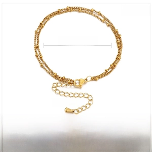 Detail of double-layer stainless steel bead chain with lobster clasp and adjustable tail