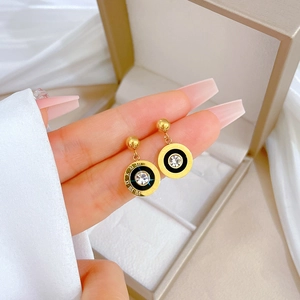 Minimalist Roman numeral stud earrings with central crystal and black enamel detail
