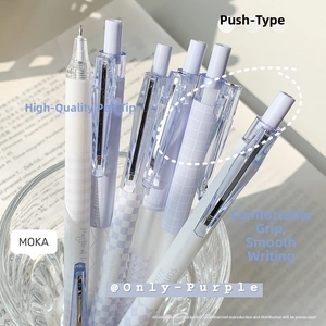 Detail of purple ST-tip gel pens in a glass holder with a soft aesthetic background