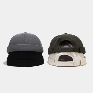 Détails des bonnets docker en velours côtelé en quatre couleurs avec boucles réglables