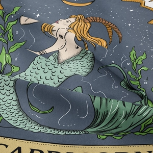 Close-up of Capricorn zodiac tapestry showing woven polyester texture and starry print